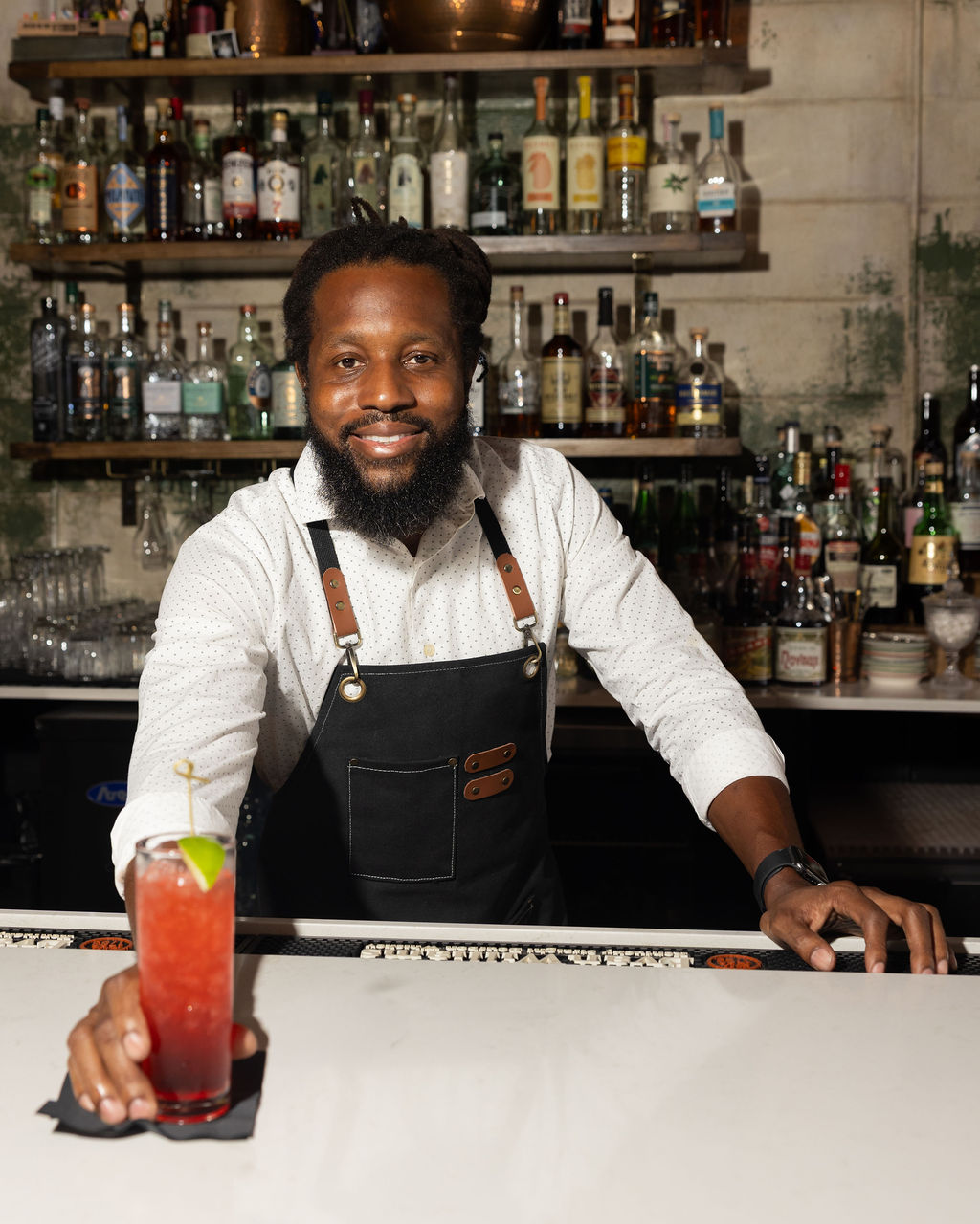 Daniel Gordon, owner and lead bartender of Rock Steady Bar Company, smiling