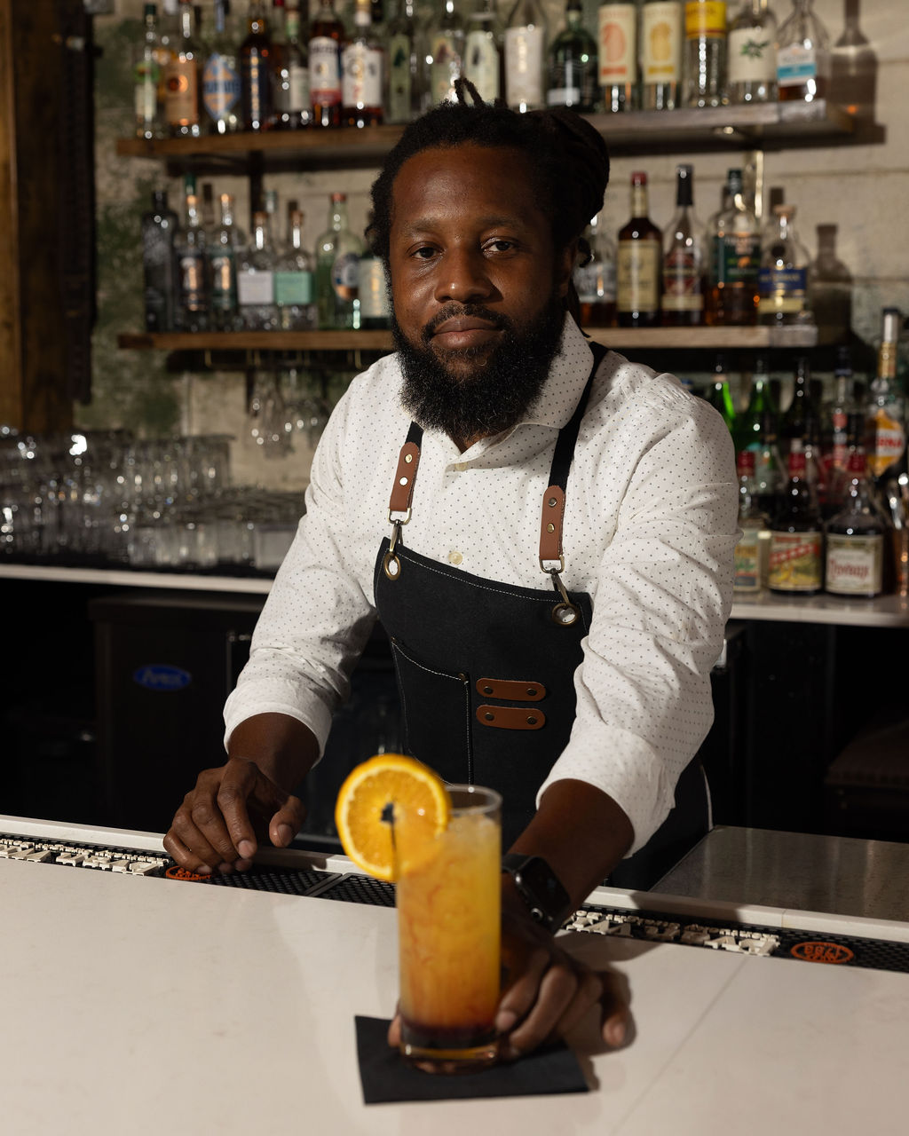 Daniel presenting a citrus cocktail
